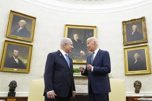 President Joe Biden, right, talks with Israeli Prime Minister Benjamin Netanyahu, left, in the Oval Office of the White House in Washington, July 25, 2024. U.S. officials say the Biden administration believes it has won assurances from Israel that it will not strike Iranian nuclear or oil sites as it looks to strike back following Iran’s missile barrage earlier this month. The officials, who spoke on condition of anonymity to discuss private diplomatic discussions, cautioned that the pledge is