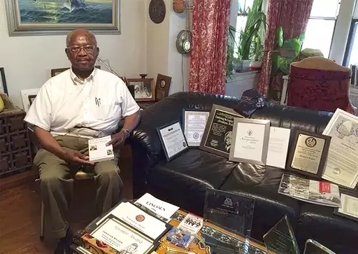 This 2016 photo shows Abraham Bolden at his South Side home in Chicago. Bolden, who served on President John F. Kennedy's detail, faced federal bribery charges that he attempted to sell a copy of a Secret Service file. His first trial ended in a hung jury.  Following his conviction in a second trial, key witnesses admitted lying at the prosecutor's request.  (Mary Mitchell/Chicago Sun-Times via AP)