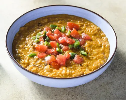 This image released by Milk Street shows a recipe for berbere spiced lentils. (Milk Street via AP)