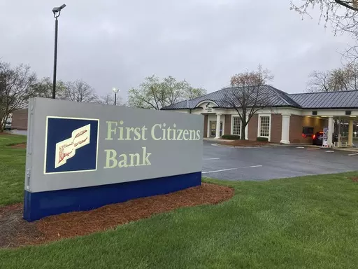 A First Citizens Bank sign is seen in Durham, North Carolina, on Monday March 27, 2023. North Carolina-based First Citizens will buy Silicon Valley Bank, the tech industry-focused financial institution that collapsed earlier this month. (AP Photo/Jonathan Drew)