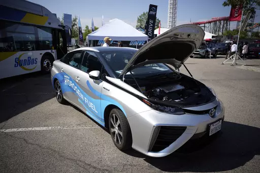 A 2021 Toyota Prius that runs on a hydrogen fuel cell sits on display at the Denver auto show Sept. 17, 2021, at Elitch's Gardens in downtown Denver. As fossil fuel emissions continue warming Earth’s atmosphere, the Biden administration is turning to hydrogen as an energy source for vehicles, manufacturing and generating electricity. (AP Photo/David Zalubowski, File)