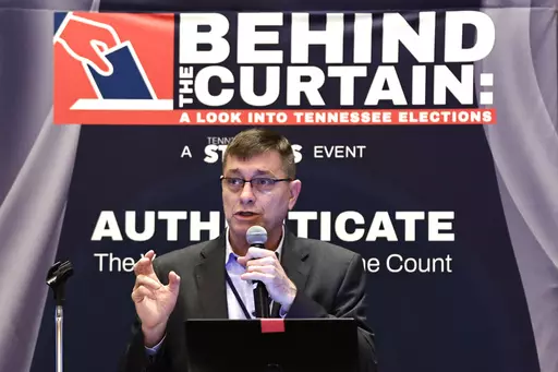 Clay Parikn talks about variables in security during an Election Conspiracy Forum Saturday, March 11, 2023, in Franklin, Tenn. (AP Photo/Wade Payne)