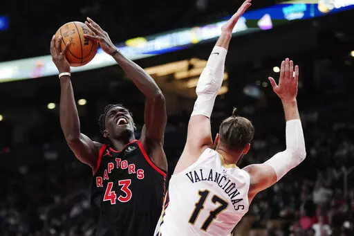 Toronto Raptors forward Pascal Siakam (43) shoots over New Orleans Pelicans center Jonas Valanciunas (17) during the second half of an NBA basketball game Thursday, Feb. 23, 2023, in Toronto. (Frank Gunn/The Canadian Press via AP)
