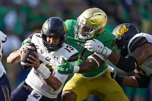 Notre Dame defensive lineman Isaiah Foskey sacks California quarterback Jack Plummer (13) on a fourth-down play during an NCAA college football game in South Bend, Ind., Sept. 17, 2022. The New Orleans Saints selected Foskey in the second round of the NFL draft Friday night, April 28, adding a second player to their defensive front in as many picks. (AP Photo/Michael Conroy, File)