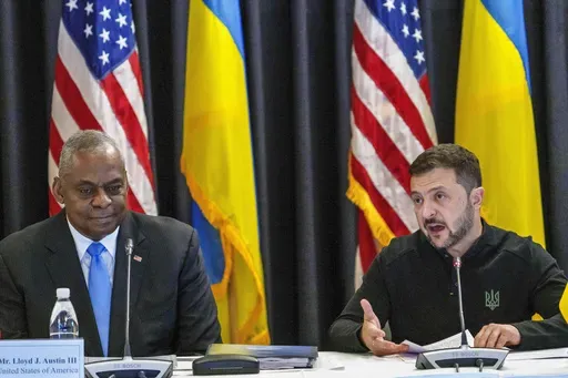 U.S. Defense Secretary Lloyd Austin, left, listens to Ukraine's President Volodymyr Zelenskyy during a meeting at Ramstein Air Base in Ramstein-Miesenbach, Germany, Friday, Sept. 6, 2024. (Andreas Arnold/dpa via AP, File)