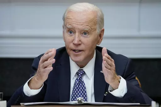 President Joe Biden speaks during a meeting with his "Investing in America Cabinet," in the Roosevelt Room of the White House, Friday, May 5, 2023, in Washington. Biden would veto a House GOP bill that aims to restrict asylum, build more border wall and cut a program that allows migrants a chance to stay in the U.S. lawfully for two years, an administration official said Monday, May 8. (AP Photo/Evan Vucci, File)