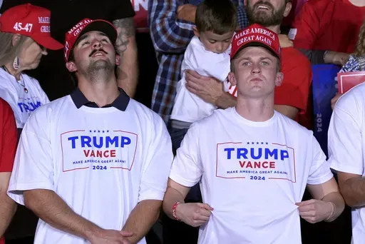 Supporters watch as Republican presidential nominee former President Donald Trump speaks at a campaign rally, Nov. 5, 2024, in Grand Rapids, Mich. (AP Photo/Evan Vucci, File)
