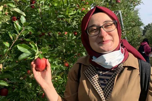 This contributed photo shows Rumeysa Ozturk on an apple-picking trip in 2021. (AP Photo)