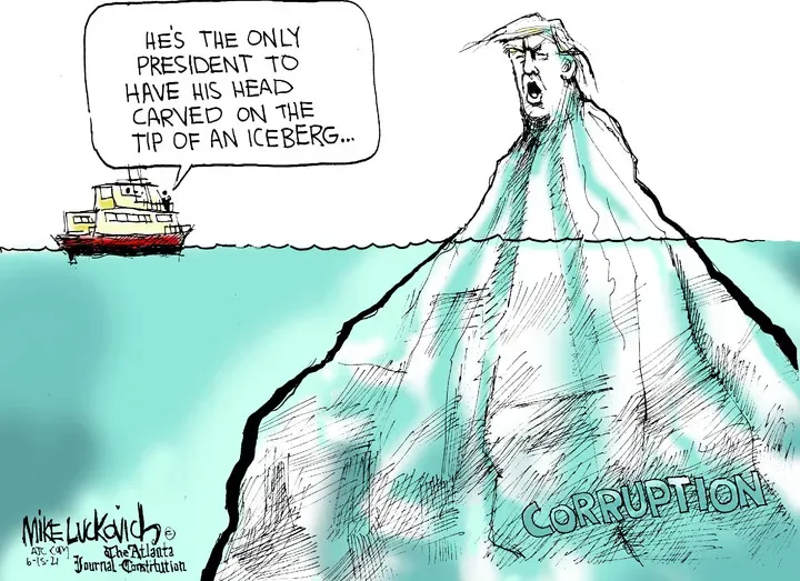 Mike Luckovich for Jun 15, 2021