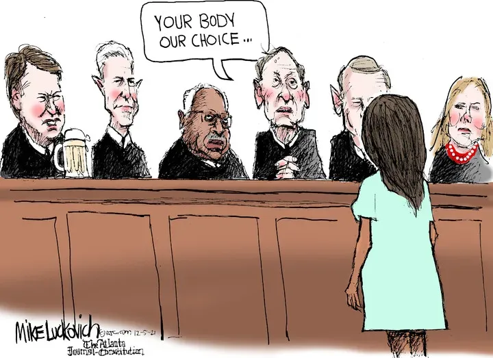 Mike Luckovich for Dec 05, 2021